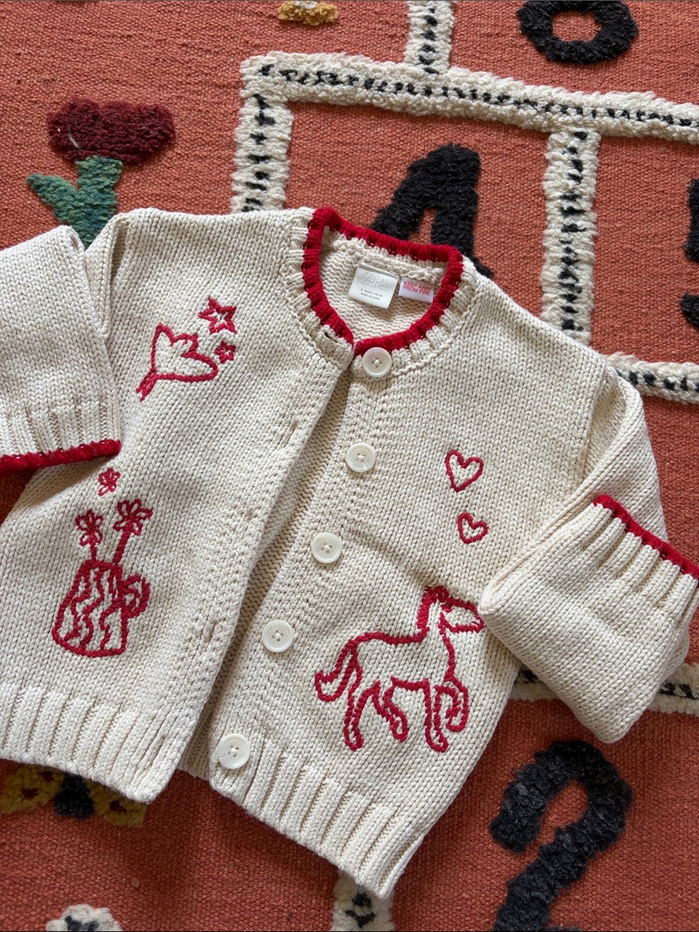 Zara Kids Cream Knit Cardigan with Red Accents and Embroidered Motifs